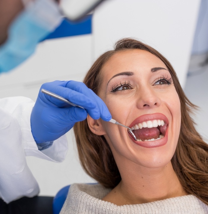 Woman receiving a dental checkup