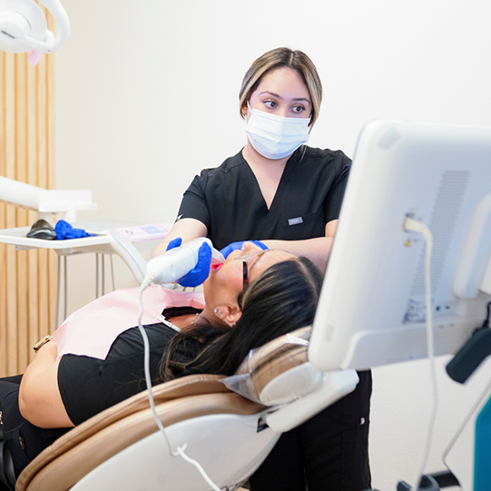 Smiling man with his arms crossed after restorative dentistry in Mansfield